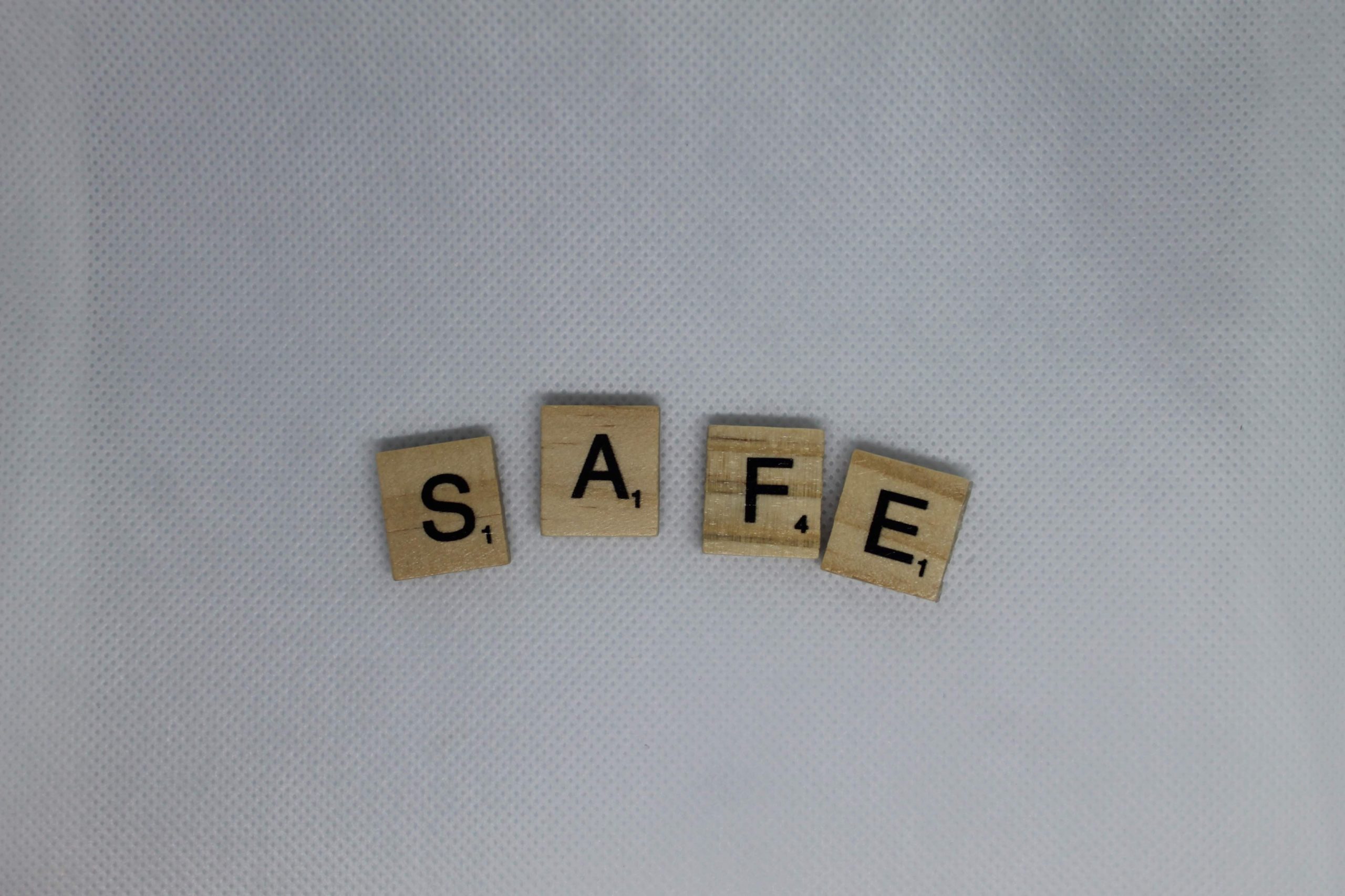 Picture of wooden blocks with letters forming the word safe 
